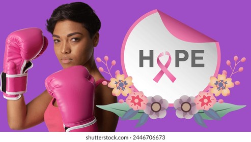 Image of hope text over african american woman wearing boxing gloves on purple background. breast cancer positive awareness campaign concept digitally generated image. - Powered by Shutterstock