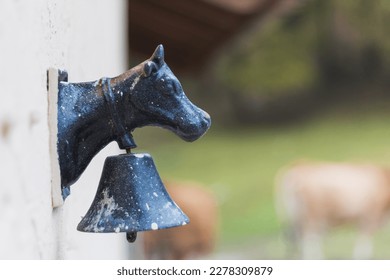 An image of a horse head silhouetted against the wall of a rustic, aged structure - Shutterstock ID 2278309879