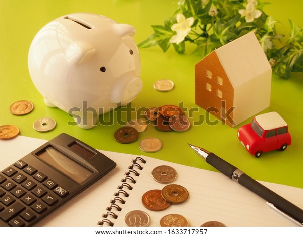 Image of household\
account book and savings