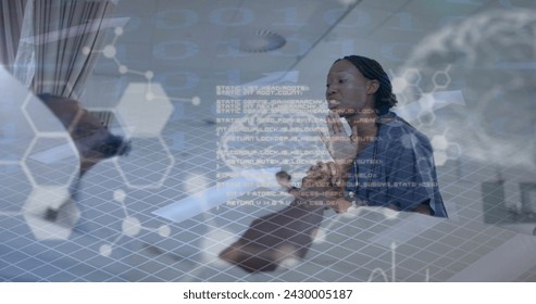 Image of human brain and data over african american female doctor and patient. Global medicine, healthcare, connections, computing and data processing concept digitally generated image.