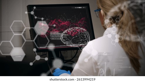 Image of human brain spinning over female scientist using computer. global science, research, data processing and digital interface concept digitally generated image.