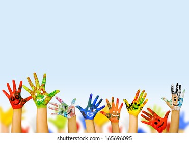 Image of human hands in colorful paint with smiles - Shutterstock ID 165696095