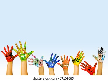 Image of human hands in colorful paint with smiles - Shutterstock ID 171096854