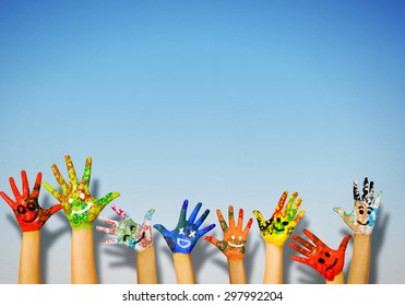 Image of human hands in colorful paint with smiles - Shutterstock ID 297992204