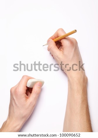 Image of human hands with pencil and eraser on white