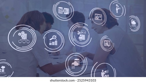 Image of icon in loading circles over diverse coworkers discussing reports in office. Digital composite, multiple exposure, business, progress, planning, teamwork, dataset and technology concept. - Powered by Shutterstock