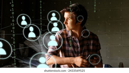 Image of icons and data processing over caucasian man using smartphone. Global digital interface, cloud computing and data processing concept digitally generated image. - Powered by Shutterstock - Get 15% off with code: PIKWIZARD15