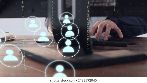 Image of icons and data processing over businessman using computer working in office. Global digital interface, cloud computing and data processing concept digitally generated image.