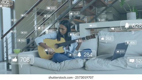 Image of icons and data processing over biracial woman playing guitar. Leisure, social media, connections, computing and data processing concept digitally generated image. - Powered by Shutterstock - Get 15% off with code: PIKWIZARD15