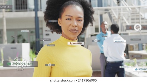 Image of icons and numbers with data processing over african american businesswoman. Global networks, business, finances, computing and data processing concept digitally generated image.