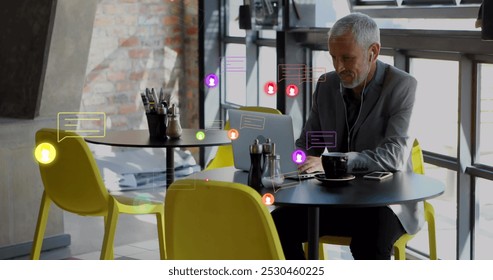 Image of icons, statistics and data processing over businessman. Global business, finance and data processing concept digitally generated image.