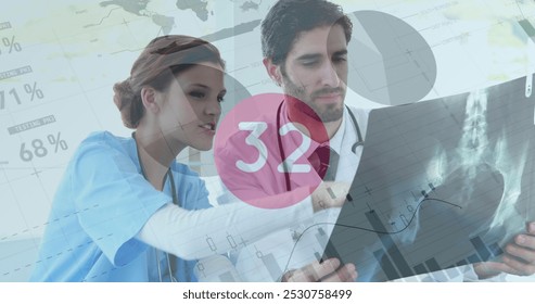 Image of infographic interface, changing numbers in circle, caucasian doctors discussing reports. Digital composite, multiple exposure, business, global, medical, healthcare, technology. - Powered by Shutterstock