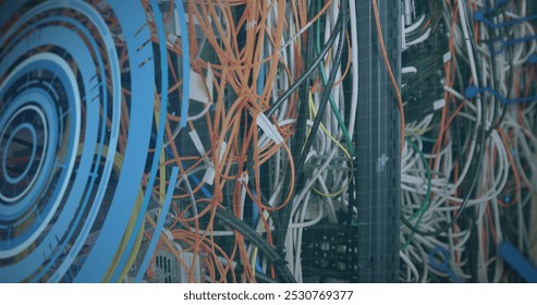Image of interface with data processing and round scanner over close up of a computer server. Computer interface and business data storage technology concept