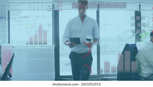 Image of interface showing data and statistics with businessman and colleagues working in office. global communication technology digital interface concept, digitally generated image.