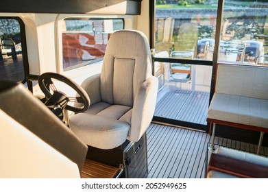 Image of the interior of a small transport motorboat.