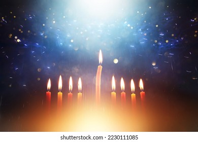 Image of jewish holiday Hanukkah with menorah (traditional candelabra) and candles - Shutterstock ID 2230111085