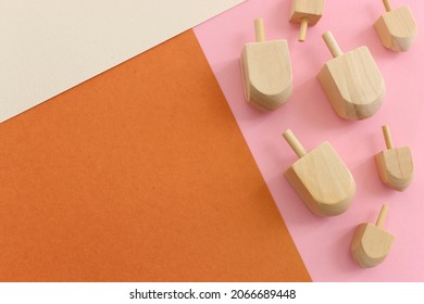 Image of jewish holiday Hanukkah with wooden dreidels colection (spinning top)