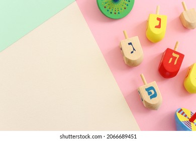 Image of jewish holiday Hanukkah with wooden dreidels colection (spinning top)