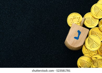 Image Of Jewish Holiday Hanukkah With Wooden Dreidel (spinning Top) And Chocolate Coins