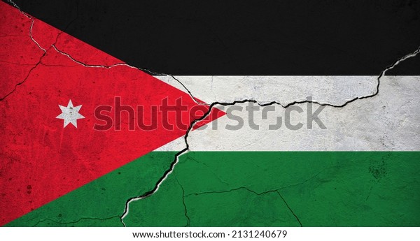 An image of the Jordan flag on a wall with a\
crack. Background.