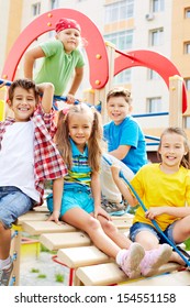 Image of joyful friends having fun on playground outdoors  - Shutterstock ID 154551158