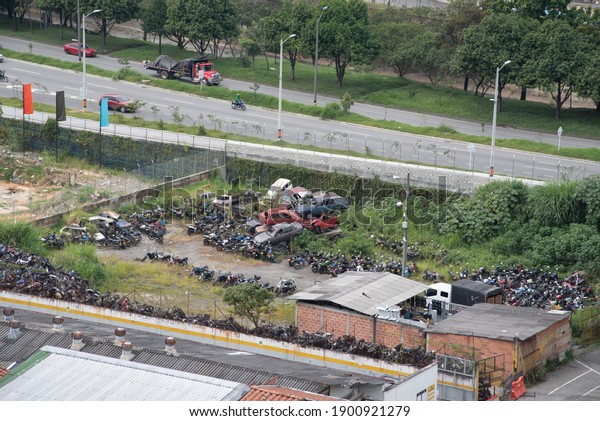 Image with
junk cars. Defined as a car
cemetery.