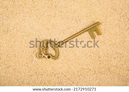 image of key sand background