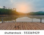 image of lake and pine forest on morning time at " Ban Wat Chan Pine Forest ", Amphoe Kallayaniwattana, Chiang Mai Thailand.