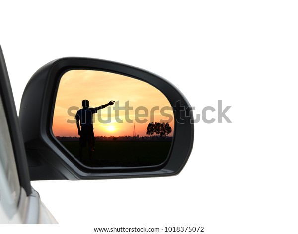 Image
of landscape in the evening on side car mirror,Silhouette of man
praying over beautiful sky on side car mirror.    
