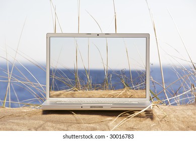 Image Of Laptop On A Beach