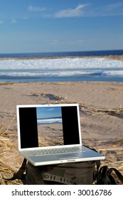 Image Of Laptop On A Beach