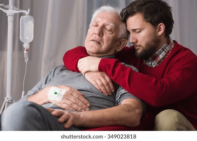 Image of last goodbye between dying father and son