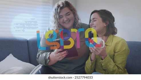 Image of lgbtq over happy caucasian lesbian couple using tablet and sitting on sofa at home. supporting lgbt rights and gender equality digitally generated image. - Powered by Shutterstock