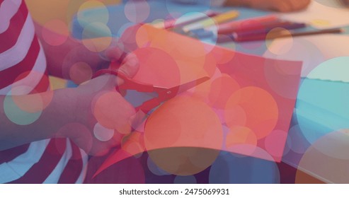Image of light spots over diverse schoolchildren at art classes. children's art week, education and digital interface concept digitally generated image. - Powered by Shutterstock
