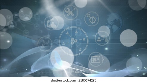 Image of light spots over network of connections with icons on blue background. Global technology, computing and digital interface concept digitally generated image.