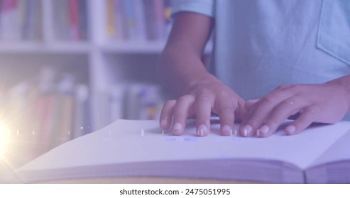 Image of light trails over biracial boy reading braille. children's book day and celebration concept digitally generated image. - Powered by Shutterstock