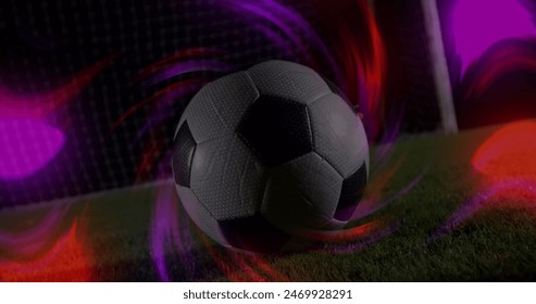 Image of light trails over male soccer player. Global sport and digital interface concept digitally generated image.