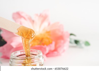 image of liquid sugar for hair removing