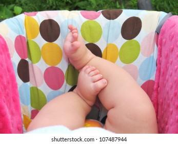   An Image Of Little Baby Feet In Carseat