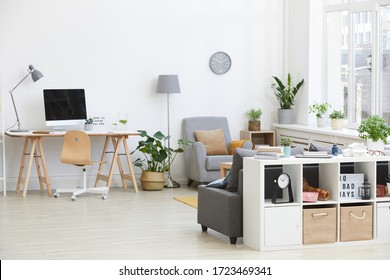 Image Of Living Room With Workplace With Computer And Armchair In The House