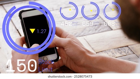 Image of loading circles with up and down arrows over caucasian man using cellphone on table. Digital composite, multiple exposure, progress, growth, digits, abstract and technology concept.