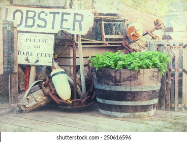 Image of lobster pots, buoys and fishing equipment on the quayside. Bar Harbor, Maine, United States.