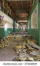 An image of a long devastated corridor