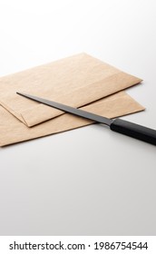 Image of mail using envelopes and paper knives