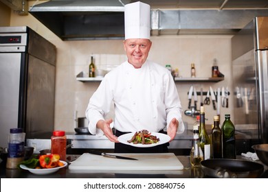 124,888 Chef holding food Images, Stock Photos & Vectors | Shutterstock