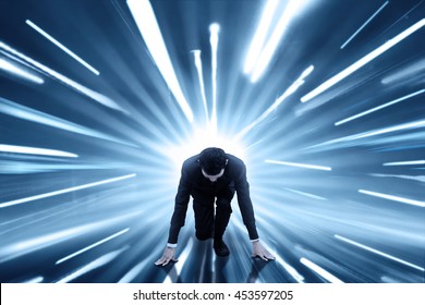 Image of male entrepreneur ready to run and compete with fast motion blur background