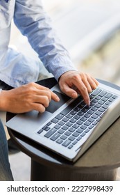 Image of male hands typing on keyboard, selective focus. - Shutterstock ID 2227998439