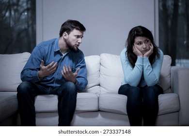 Image Of Man Apologizing His Girlfriend After Quarrel