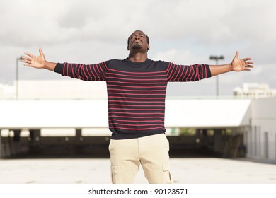 Image Of A Man With Arms Outstretched