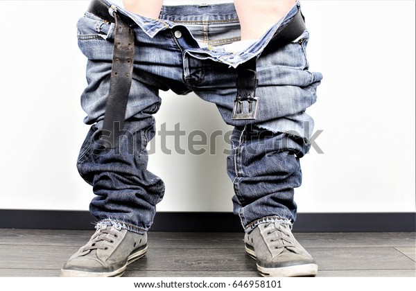 An Image of a man with\
down pants